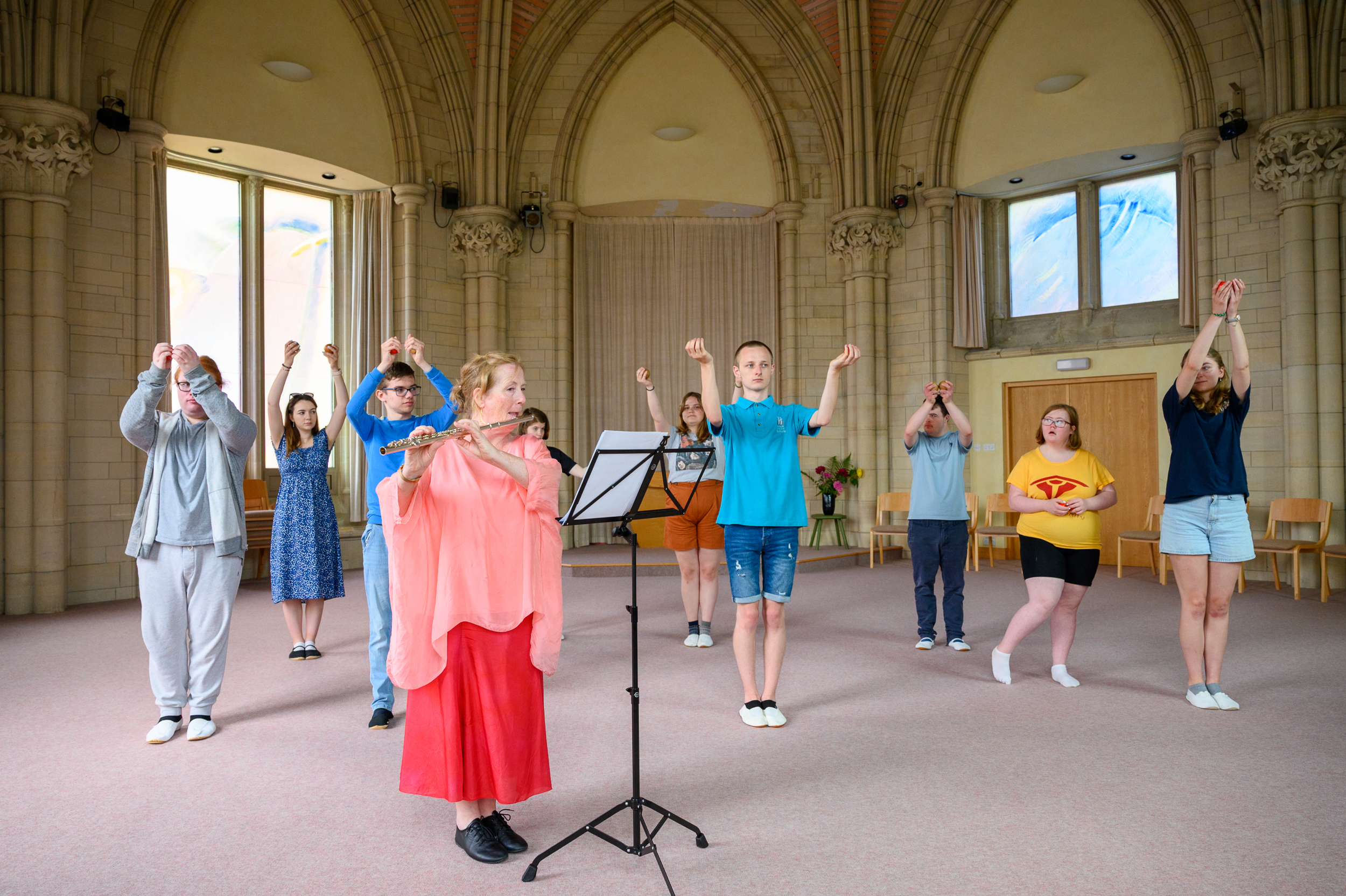 A group of Students and Coworkers taking part in a Eurythmy session.