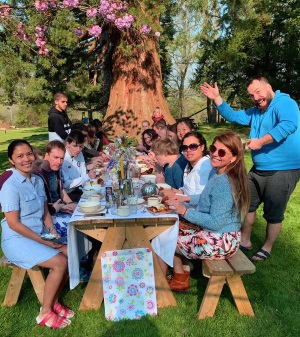 A group of people eating lunch outdoors