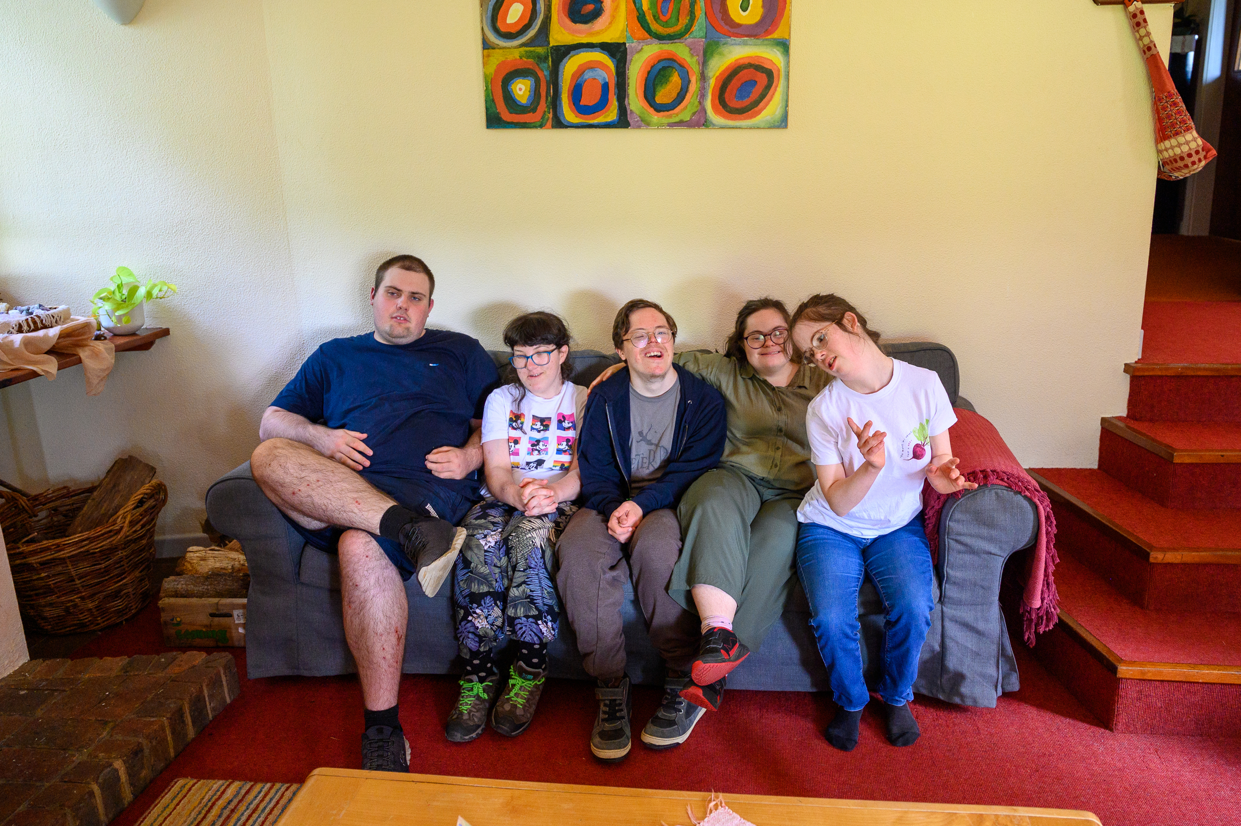 A group of students enjoying some relaxation time in the house