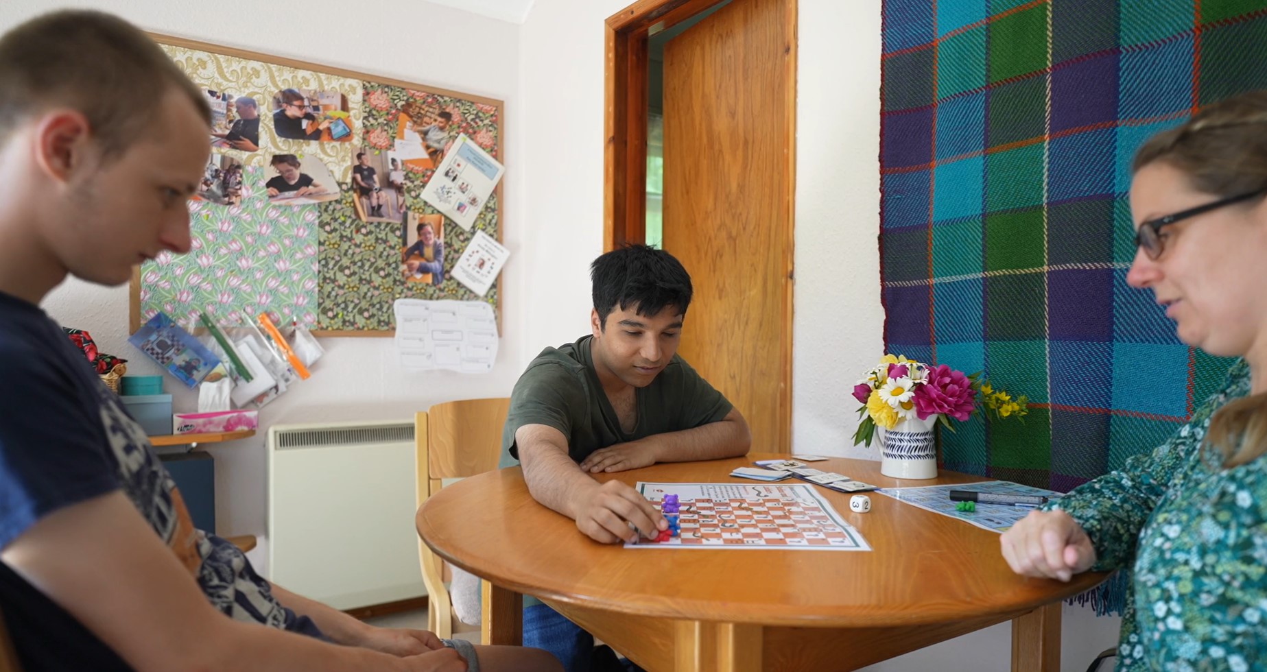 Two Students playing a board game with our Speech & Language Therapist. Two Students playing a board game with our Speech & Language Therapist.