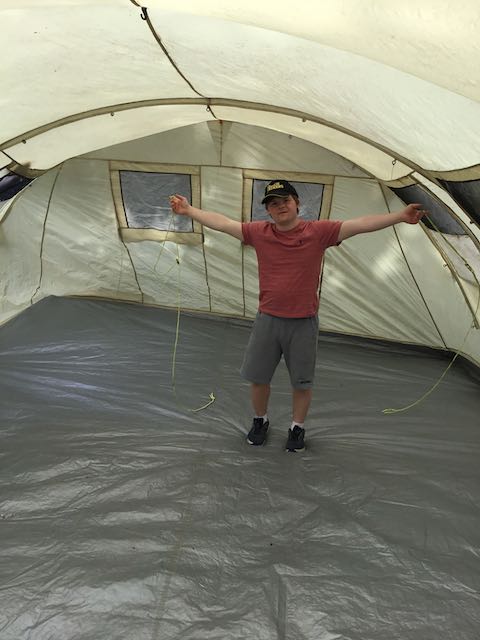 student in new tent