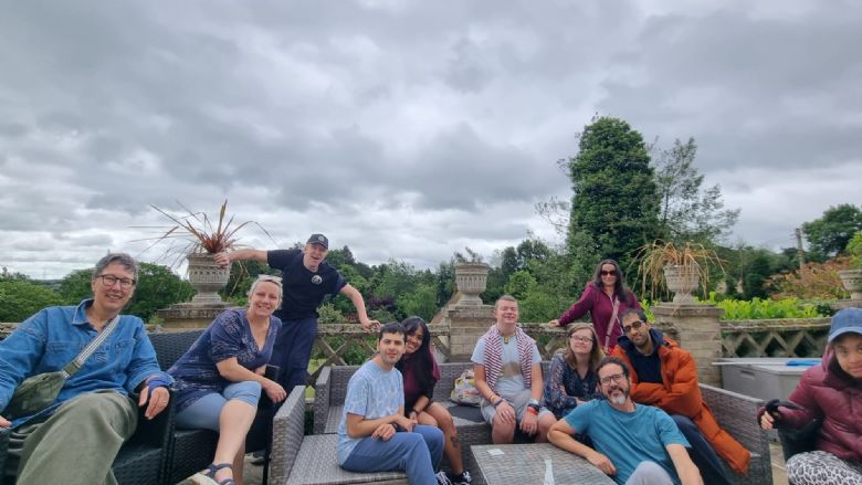 Group of people sitting outside