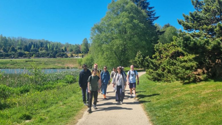 Group of walkers by lake